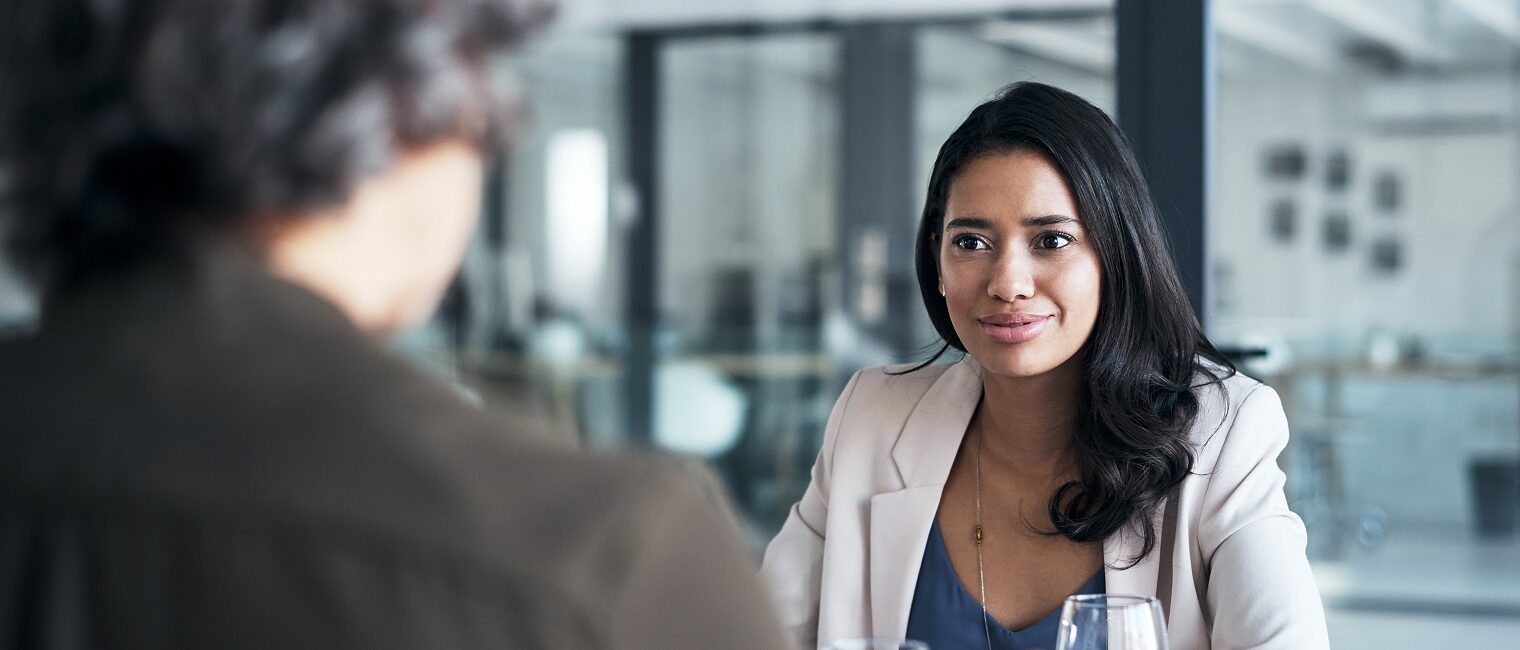 Shot of two businesswomen having a meeting in an office